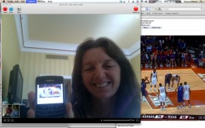 A screen shot of skyping with Trudi in Qatar.  She is showing me her Blackberry with the email of the KU score on it live.  It is 8am there and 11pm here.