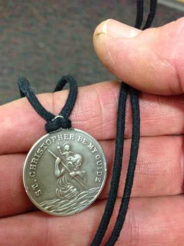 I started wearing this St. Christopher medal my mother gave me last week again after the string broke.  I thought it was bringing me good luck, but it doesn't seem that way.  Had to take it off for the MRI yesterday.