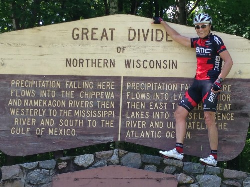 Dennis missin' around at the Great Divide marker outside of Grandview.