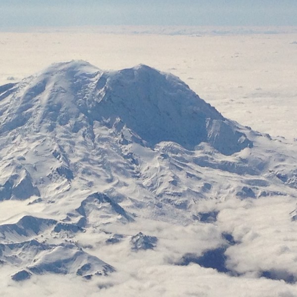 Flying in, the local volcanoes are completely buried in snow already.