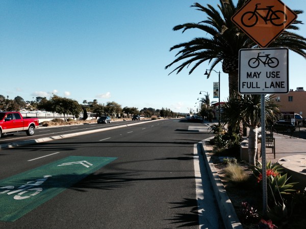 Many of the coast towns in North County are becoming real bike friendly and allowing bicycles full use of the right lane.