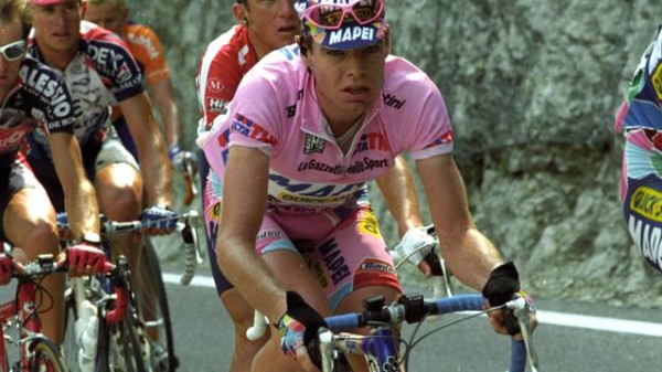 Riding in pink in 2002.  Tyler Hamilton is behind him.