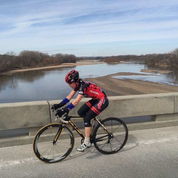 Catherine riding over the Kansas River.  It is super low.