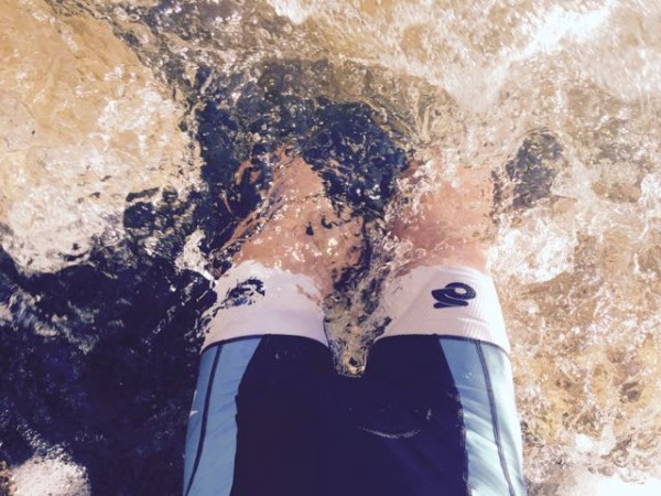 Soaking my legs in the chilly water of the Blue River.