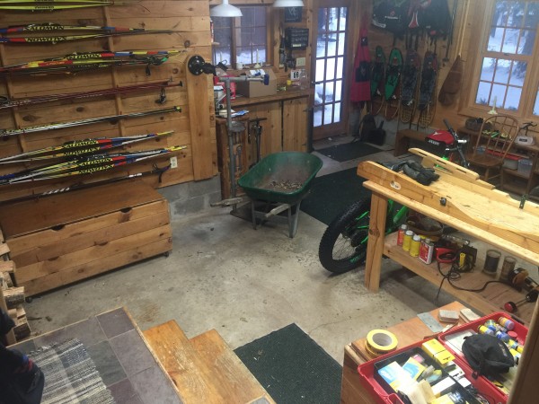 Dennis' bike room switches into a winter sports complex depending on the season.