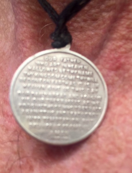 My St. Christopher medal has the Lord's Pray on the back.  Pretty small writing. 