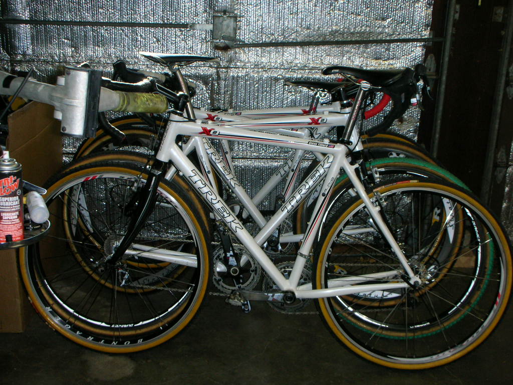 Stack of bikes in the garage.