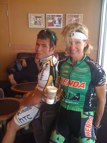 Catherine with Mark Cavendish at Starbucks before the race.  She told him he would win for sure.  Who is bigger?