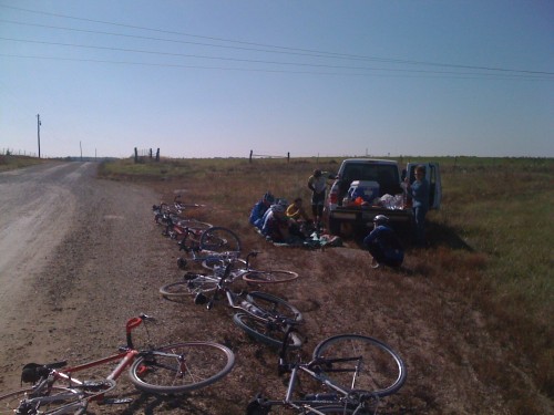 What is left of the group huddling at the lunch stop at 60 miles.  It's not the temperature, it's the wind that gets you.