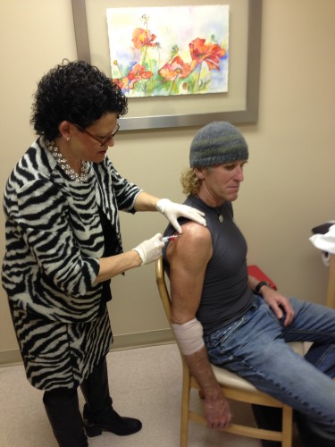 Stacie injecting the platelets back into my shoulder.