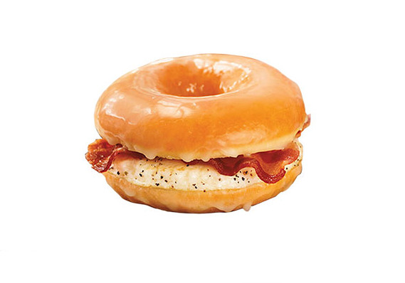 I saw that Dunkin Donuts is making a breakfast sandwich with an egg, bacon, layered by a donut.  I wouldn't be adverse to eating this.  They say it only has 360 calories, less than a blueberry muffin they sell.  Weird.