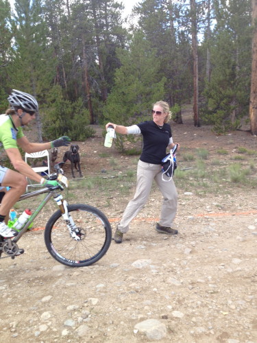 Michelle, Brian's wife, feeding him at the last feed zone yesterday.  
