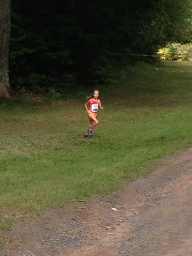 This little girl was haulin' on the 5 km.  