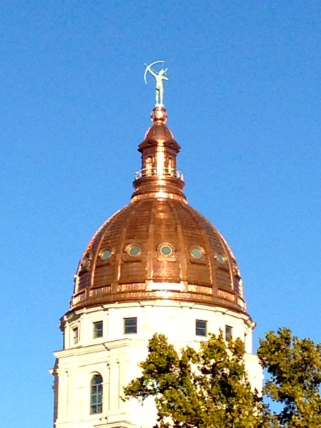 They just finished putting a new copper dome on the Capitol.  The last one was leaking, I guess.  It will eventually turn green, but maybe not for decades.