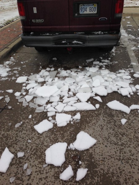 I knocked this off the roof of my van at Love Field in Dallas.  I was worried about the ice launching off into the windshield of a following car or truck.