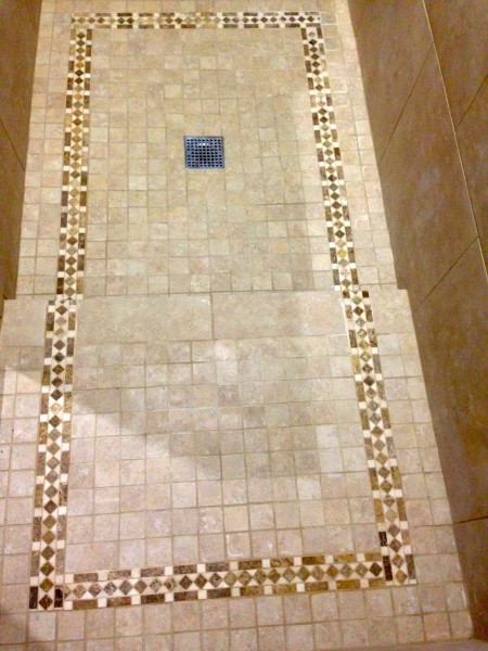 The accent trim on the floor was sort of a hassle since it wasn't the same width as the mosaic tiles.