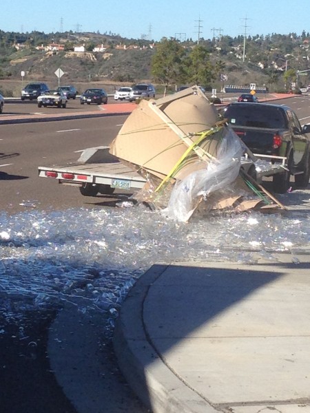 We saw this truck on La Costa dump over a load of bottles.  It happened in slow motion.