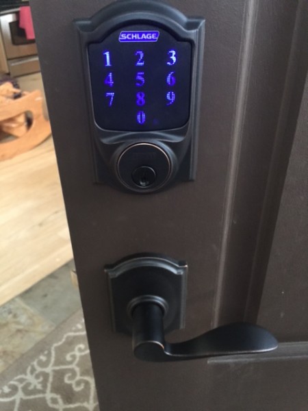 New deadbolt and handle.  The deadbolt is connected to the Internet and you can program it to open from your phone.