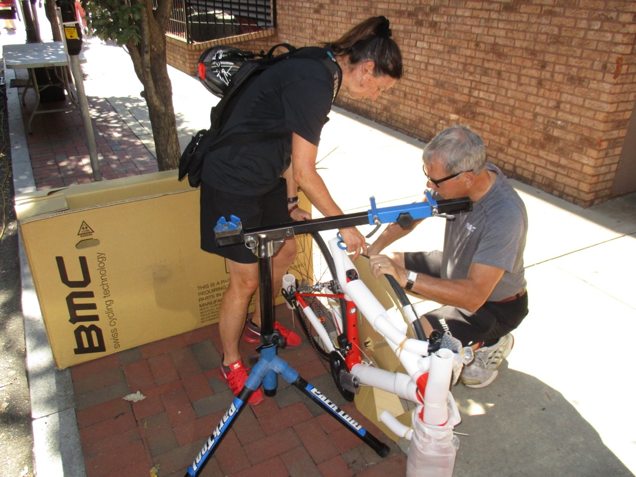 Trudi got a new road bike from BMC. Looks like Andrej Bek is helping her assemble it.
