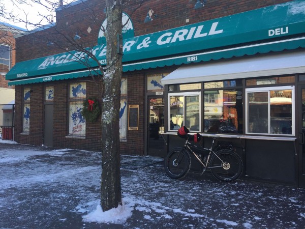 You don't often see a $10000 Fatbike parked in front of a bar at noon when it is -10 out.