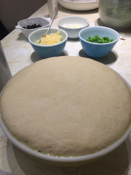 Pizza dough that has risen.