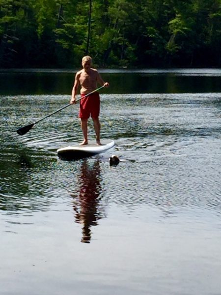Dennis paddling in with Tucker.