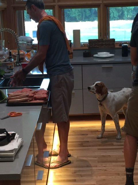 Matt Gilhousen had a party after the race. Tucker was way interested in the stack of meat Matt was preparing.