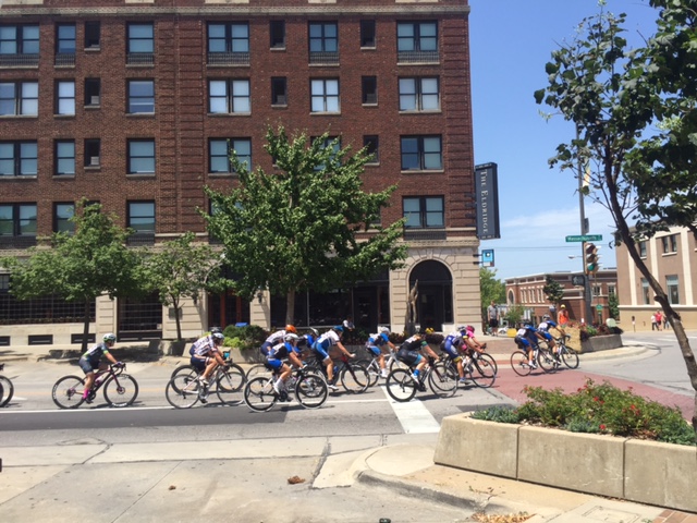 The women racing in front of the historic Eldridge Hotel in downtown Lawrence.
