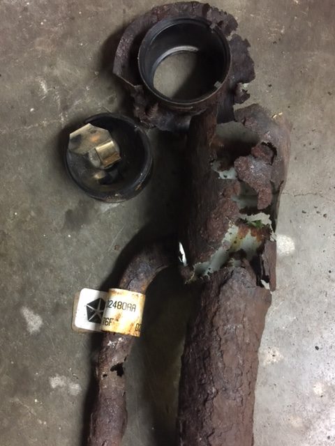 Gas filler neck I replaced. How rusted was this?